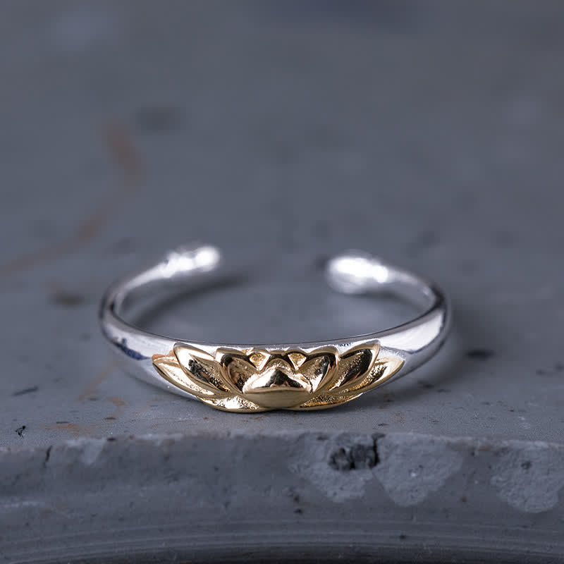 925 Sterling Silver Lotus Ring – Two-tone silver and gold lotus on adjustable band on gray stone, lotus ring