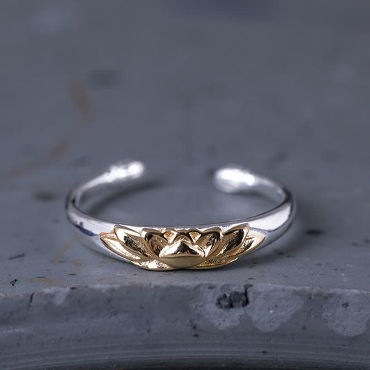 925 Sterling Silver Lotus Ring – Two-tone silver and gold lotus on adjustable band on gray stone, lotus ring