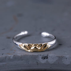 925 Sterling Silver Lotus Ring – Two-tone silver and gold lotus on adjustable band on gray stone, lotus ring