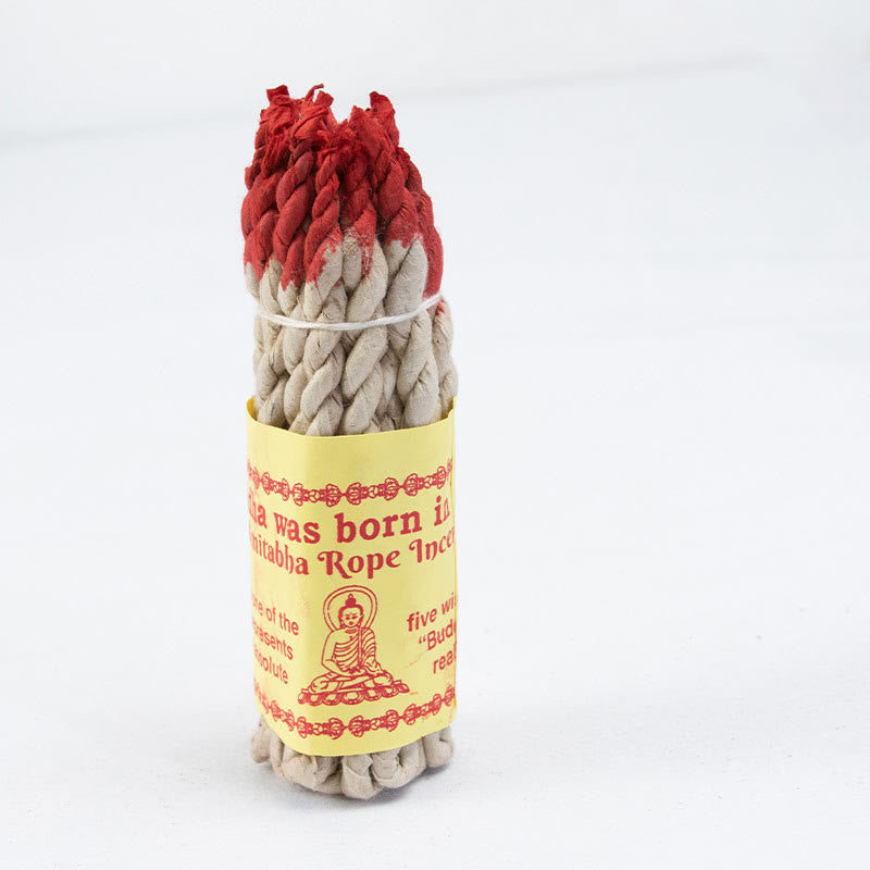 Nepal Rope Incense - single red-tipped bundle with Buddha label on white, purifying