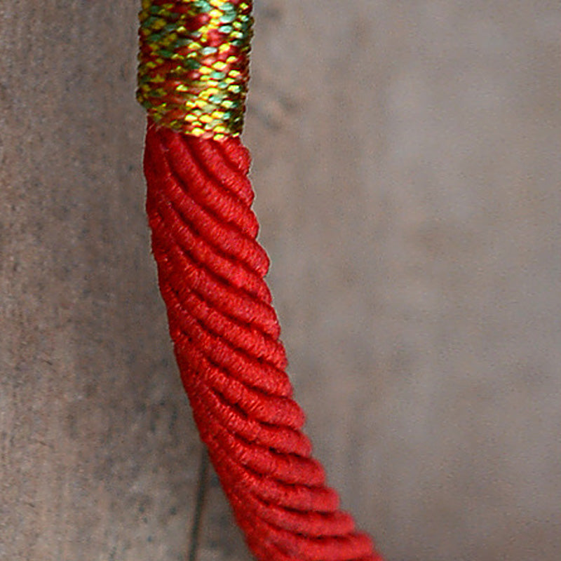 Gold-Plated PiXiu Red String Bracelet – close-up red braided rope with gold metallic thread wrap, cord detail