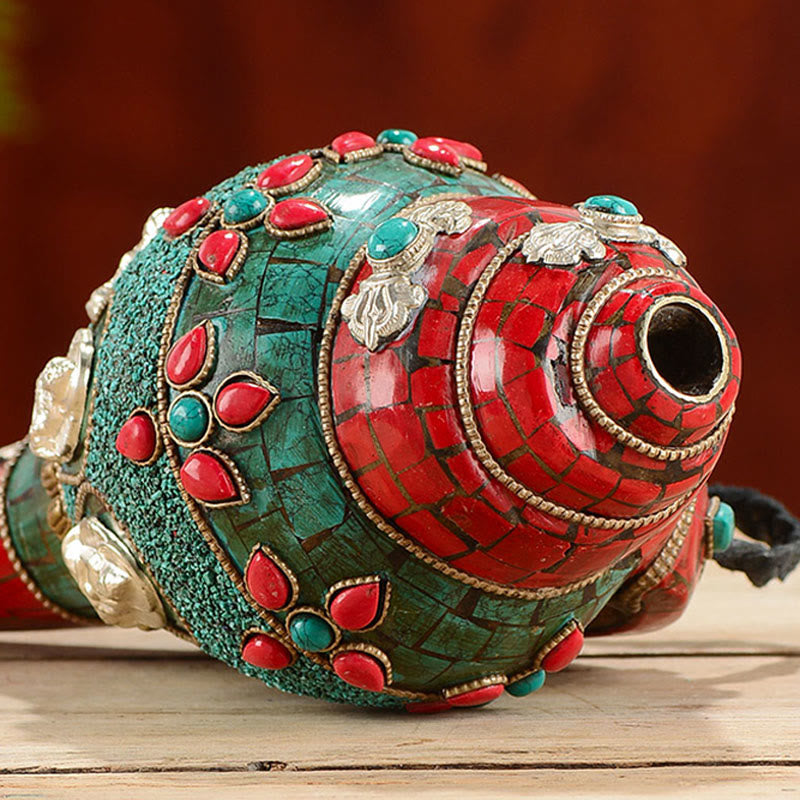 Turquoise Shankha Conch – held in palms showing compact size and intricate stone placement, spiritual gift