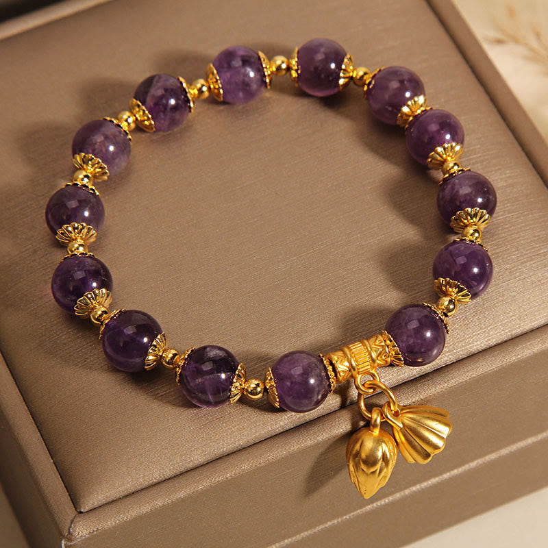Natural Amethyst Lotus Healing Bracelet - round purple amethyst with gold lotus bud and bloom charms, calming