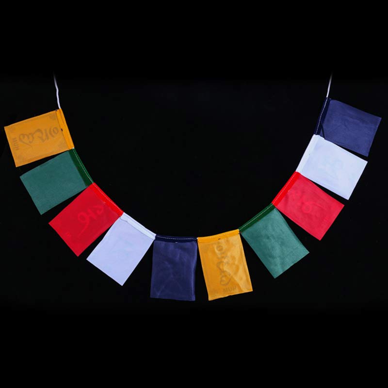 Tibetan Prayer Flags – String of ten translucent flags on black background with natural drape, Buddhist banner