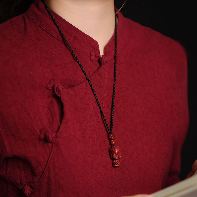 Chinese Zodiac Cinnabar Pendant – Worn with traditional Chinese mandarin collar shirt, cultural jewelry