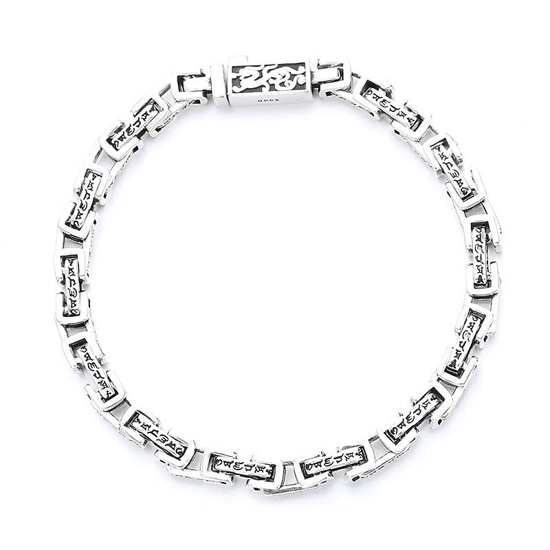 Dragon Om Mani Padme Hum Copper Bracelet - polished silver-tone copper link bracelet with rectangular box links engraved with Tibetan Om Mani Padme Hum mantra, central gold dragon motif clasp, flat lay on white background
