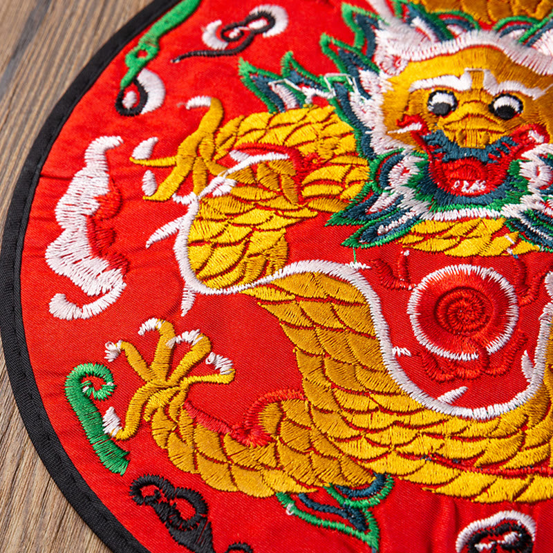 Dragon Embroidery Tea Cup Coaster Mat - red base front-facing dragon with green mane, three-quarter view, textured