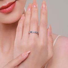 925 Sterling Silver Evil Eye Heart Ring – model hand wearing ring with nude manicure, lifestyle beauty shot