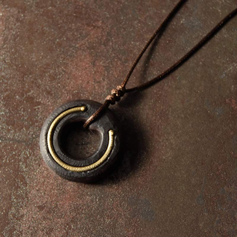Dark Wood Donut Pendant - hardwood ring with brass metal inlay on leather cord, bohemian men's necklace