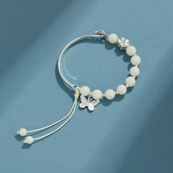 Bodhi Seed Butterfly Lotus Bracelet – Worn on wrist, natural bodhi seed lucky bangle