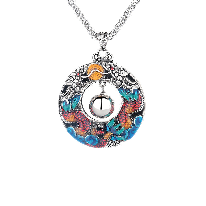 Double Dragon Copper Necklace – Front view of double koi harmony ball pendant, turquoise coral enamel, white background