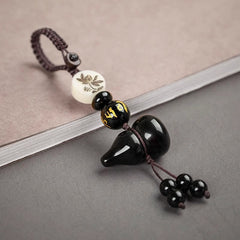 Black Obsidian Hulu Gourd Keychain – Lotus, side view, lucky charm
