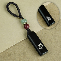 Ebony Eight Guardians talisman keychain with silver inlay for Rooster zodiac Buddhist protection