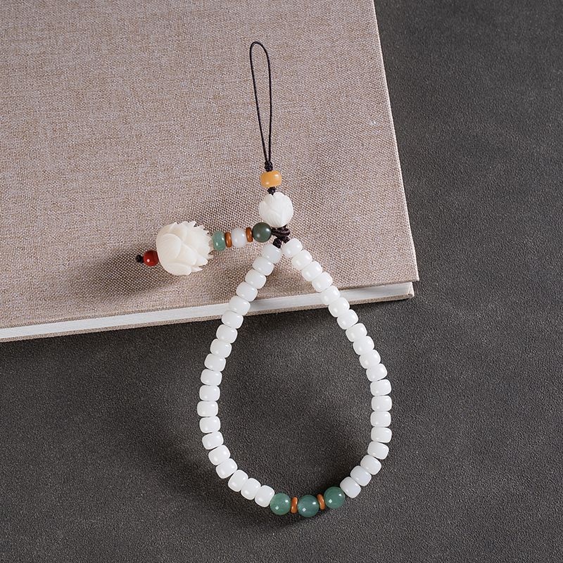 White Jade Bodhi & Jadeite Crystal Phone Charm – Green cord variation with green jade beads, red flower accent, and bodhi seeds