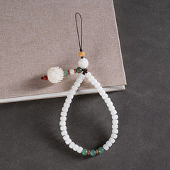 White Jade Bodhi & Jadeite Crystal Phone Charm – Green cord variation with green jade beads, red flower accent, and bodhi seeds