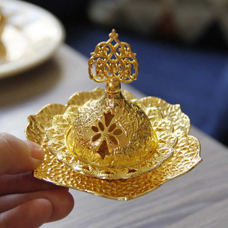 Gold Leaf Coaster Incense Burner handheld showing size, lotus base with dome, alloy incense holder