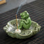 Ceramic Frog Incense Burner – Close-up with hand holding incense, Intimate scale