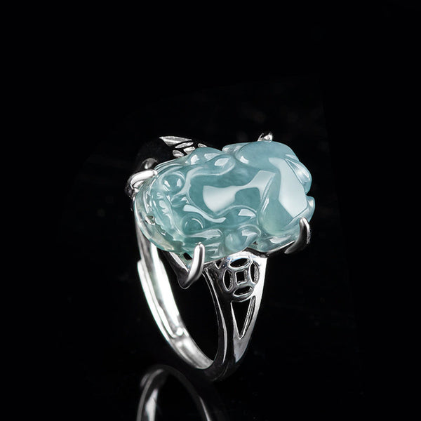 925 Sterling Silver Jade PiXiu Luck Ring – Dramatic side view of jade PiXiu ring on black with reflection