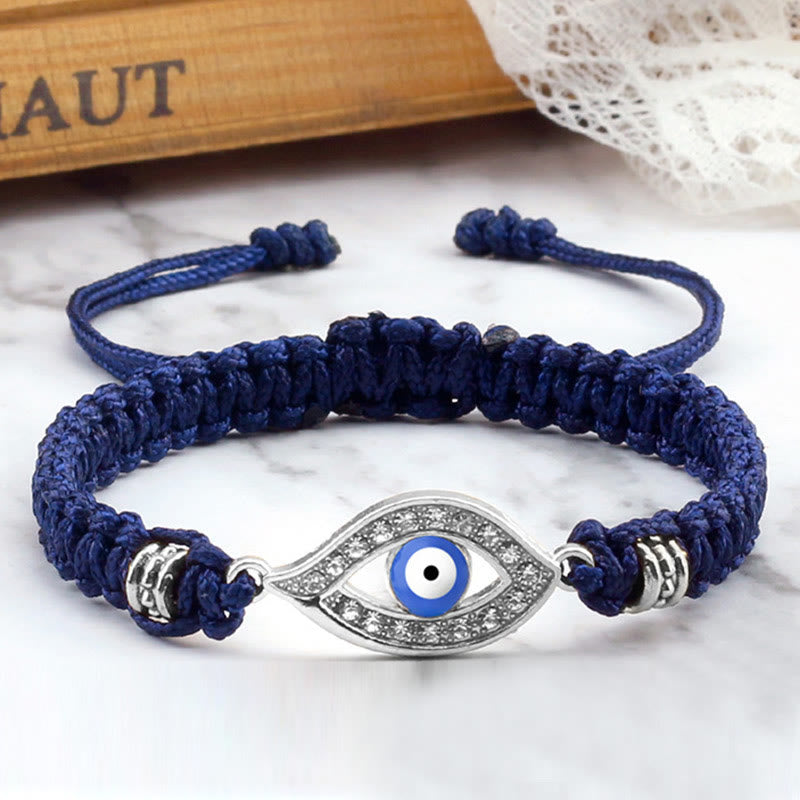 Royal blue cord evil eye bracelet with silver crystal pave evil eye charm, marble styling