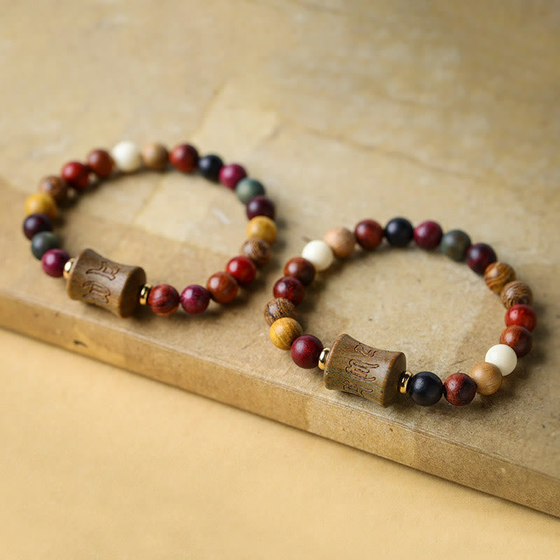 Multicolored Sandalwood Prayer Bracelet – Two strands displayed side by side, paired sandalwood beads