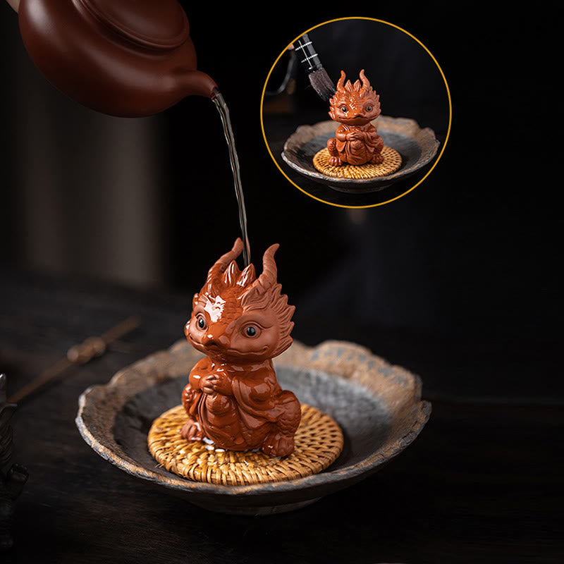 Luck Dragon Tea Pet - dragon beside tea cups on dark surface, tea ceremony decor