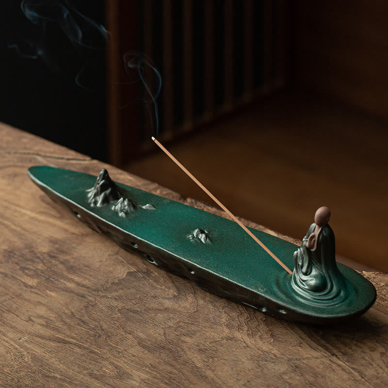 Buddha Monk Sea Wave Mountain Ceramic Incense Burner – Dark green monk figure on mountain base with smoke, ceramic incense holder