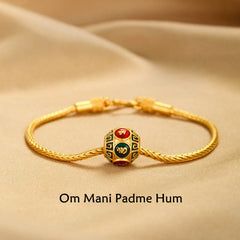 18K Gold Om Mani Padme Hum Koi Fish Bracelet – hexagonal enamel bead with red green mantra symbols on braided gold chain, beige silk