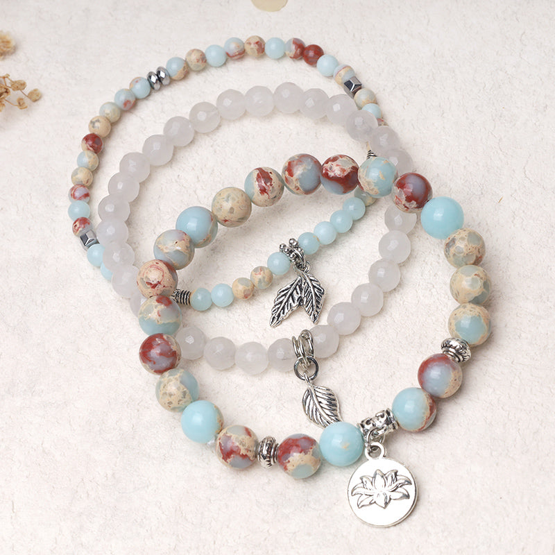 Lotus Bracelet Set – blue impression jasper and rose quartz beads with silver feather and lotus charms, boho bracelet