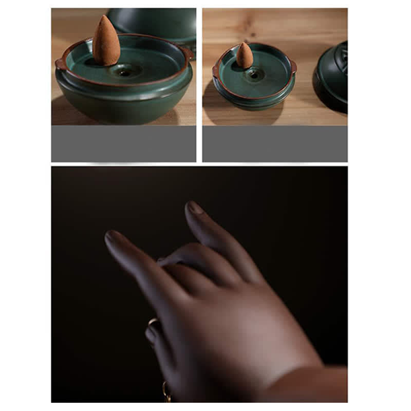 Tibetan Lotus Ceramic Incense Burner – front view of white monk figurine with smoke on dark surface, Contemplative