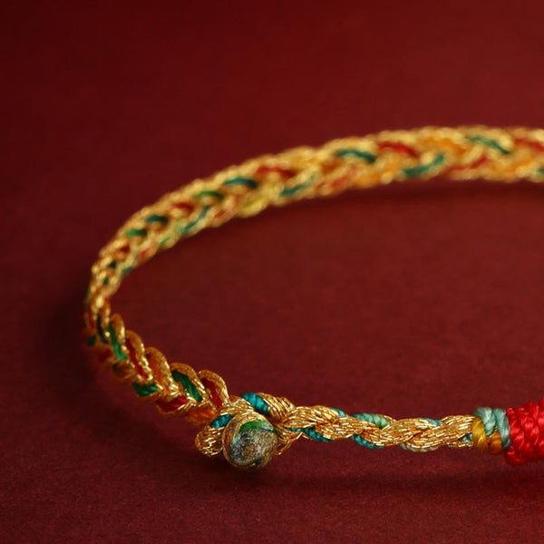 Year of the Dragon Braided Bracelet - Macro of woven knot with natural stone bead closure, Artisan detail