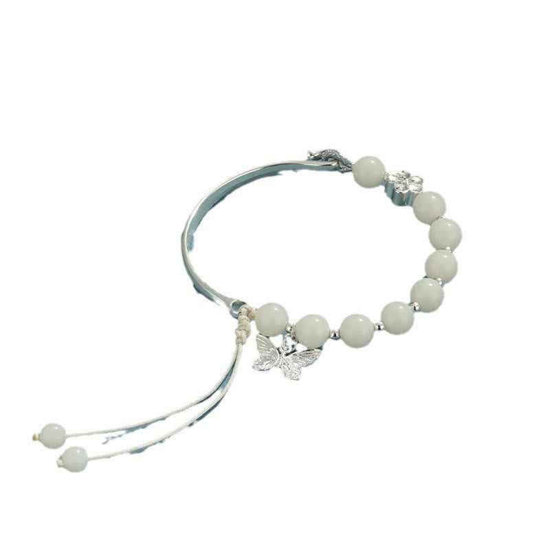 Bodhi Seed Butterfly Lotus Bracelet – String knot and clasp detail, adjustable wrist mala