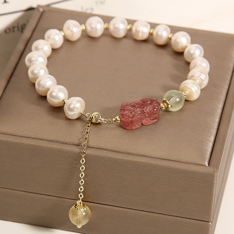 Pearl Strawberry Quartz PiXiu Bracelet – Freshwater pearls with pink PiXiu on brown jewelry box