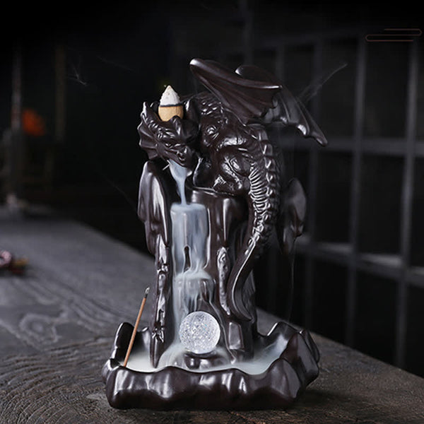 Nordic Dragon Backflow Incense Burner with yin-yang medallion, active smoke waterfall on dark wood, ceramic dragon