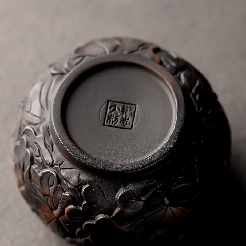 Ceramic Tea Cup – Base view with foot ring and carved artisan seal, dark stoneware tea cup