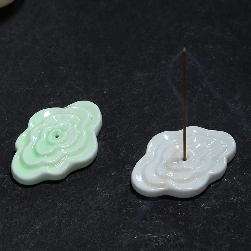 Mini Auspicious Clouds Ceramic Incense Burner – mint green and white cloud-shaped holders with smoke on dark stone, ceramic incense set