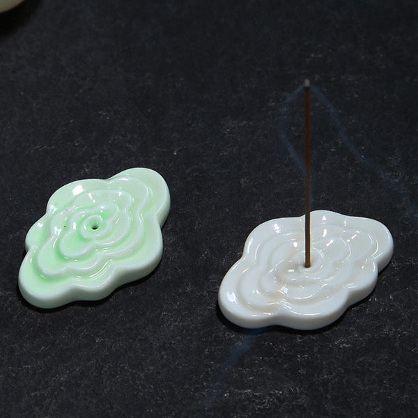 Mini Auspicious Clouds Ceramic Incense Burner – mint green and white cloud-shaped holders with smoke on dark stone, ceramic incense set