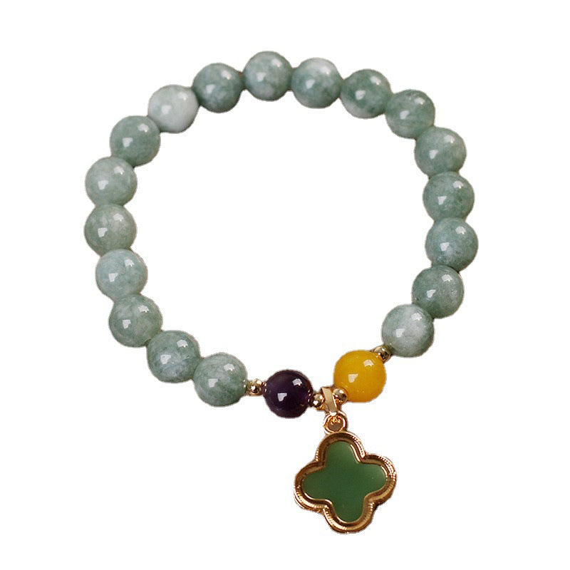 Natural jade beaded bracelet with amethyst and amber accent beads, gold four-leaf clover charm, stretch fit women's gemstone jewelry