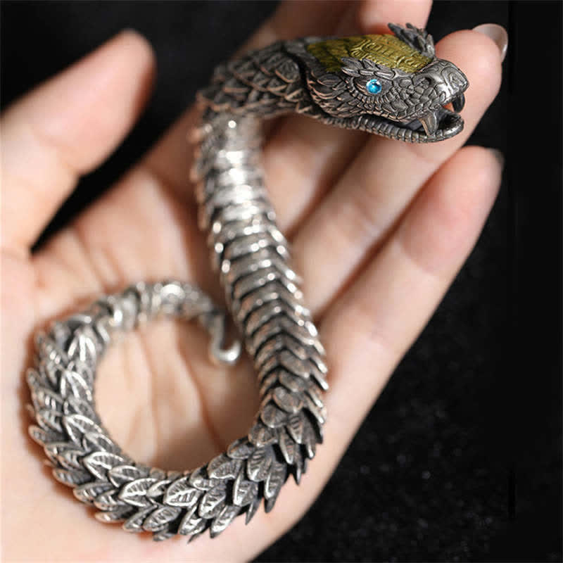 Dragon Snake Copper Bracelet – Fully articulated scale segments on hand against black, Mysterious
