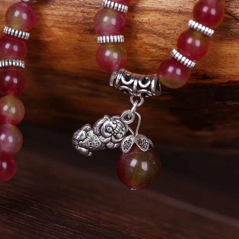 Watermelon Tourmaline Bracelet – Close-up silver PiXiu charm with leaf detail and bead pendant