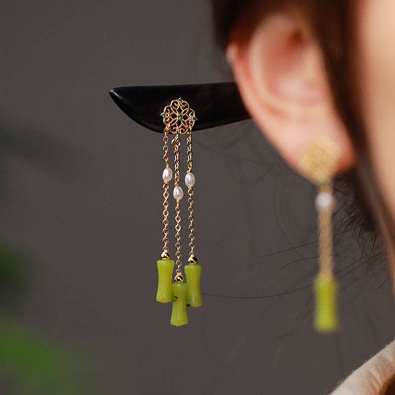 Peridot Ebony Wood Hairpin, styled in hair bun close-up behind ear view