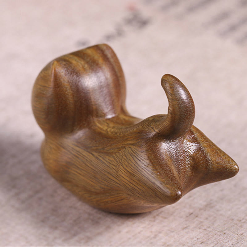 Green Sandalwood Cat Incense Burner - Three-quarter view of polished sleeping cat, zen