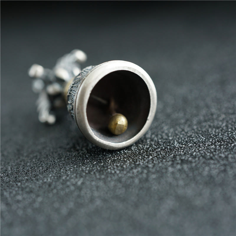 925 Silver Dorje Bell Pendant – Interior view showing brass clapper inside silver ritual bell, macro