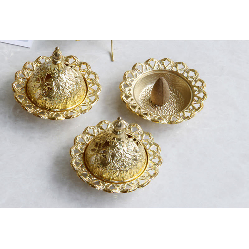 Tibetan Gold Mini Meditation Incense Burner – Gold burners with heart-shaped cutout rims, one open with brown incense cone