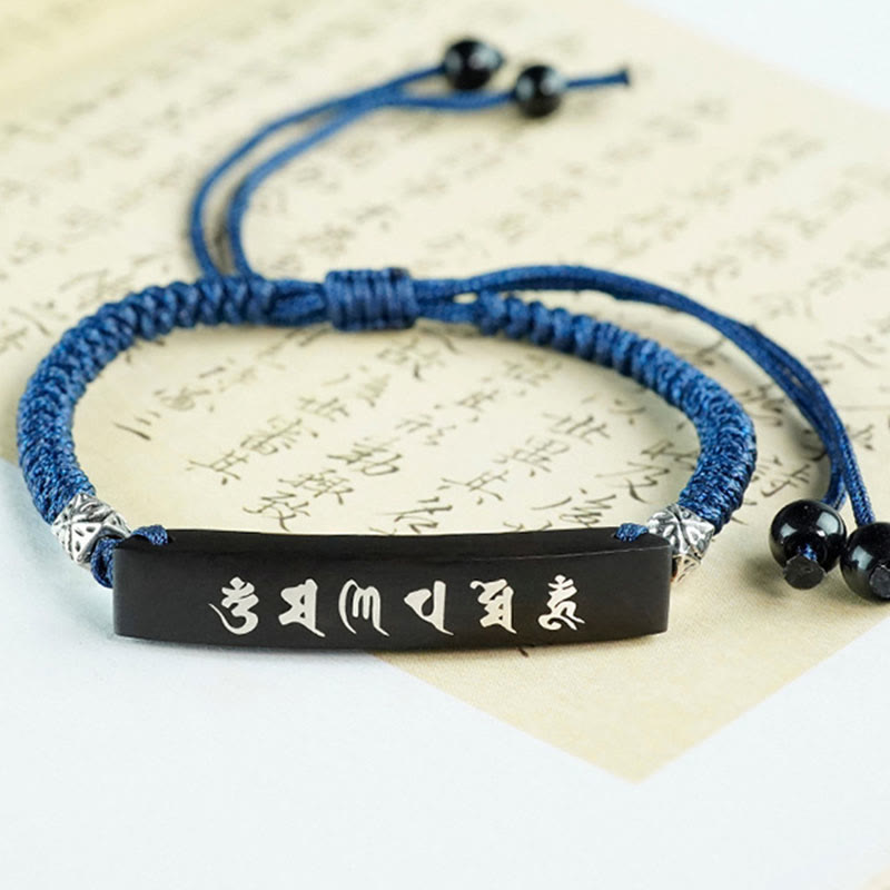 Ebony Wood Sanskrit Bracelet – Mantra plaque on aged calligraphy paper, blue woven cord detail