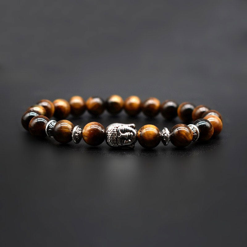 Amethyst Buddha Bracelet – Studio dark background shot of tiger eye beads with Buddha, confidence