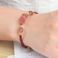 Strawberry Crystal PiXiu Charm Lucky Red String Bracelet – close-up detail of strawberry quartz PiXiu carving and crystal clarity, wealth talisman