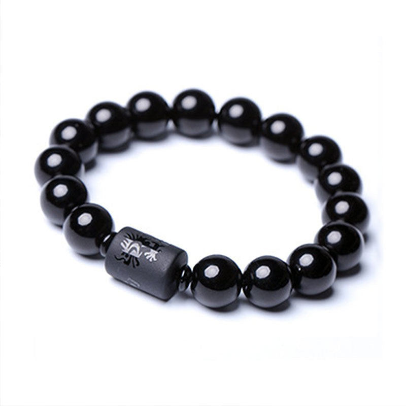 Black Obsidian Phoenix Dragon Bracelet – Polished black beads with silver symbol accent, Strength