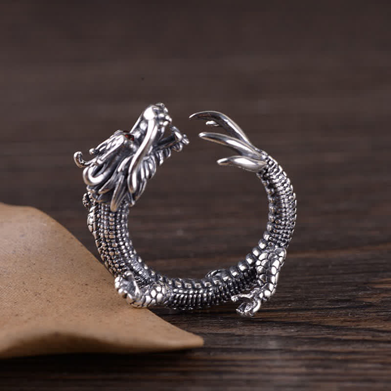 925 Sterling Silver Dragon Ring – Open cuff design with scaled body and kraft paper prop on wood, Artisan