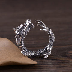 925 Sterling Silver Dragon Ring – Open cuff design with scaled body and kraft paper prop on wood, Artisan