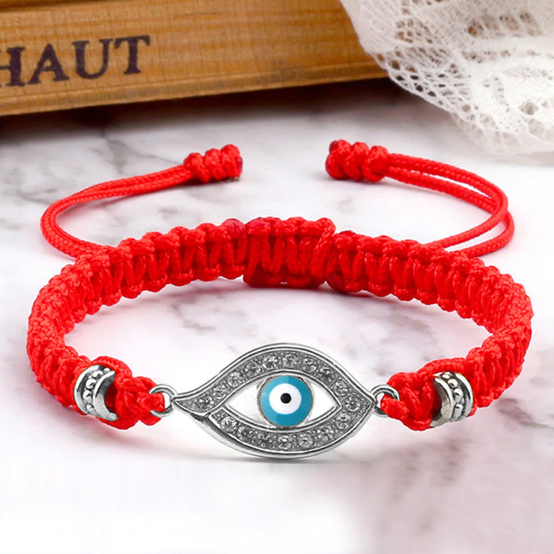 Red cord evil eye bracelet with silver blue evil eye crystal pave charm, marble photo